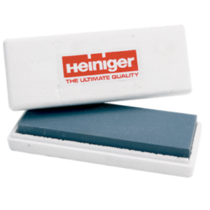 Heiniger Acutecc Hollow Gauge Grinder with silicon carbide checking stone and grinding technique wall chart
